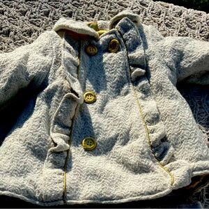 Cream knit peacoat with gold trim